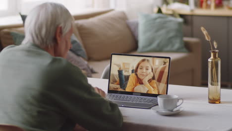 Senior-Man-Talking-with-Granddaughter-on-Web-Call